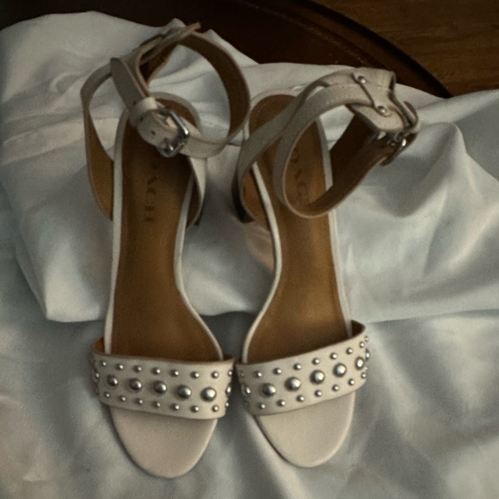 Coach pre owned ankle strap sandals! They have 
Silver brads on them! So cute.